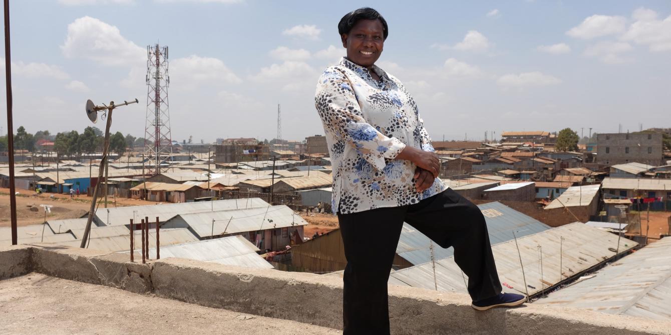 Jane Muthoni, 50, on the roof of her building in Kawangware, Nairobi, Kenya 2016. Photo Credit: Allan Gichigi Jane Muthoni, 50, on the roof of her building in Kawangware, Nairobi, Kenya 2016. Photo Credit: Allan Gichigi